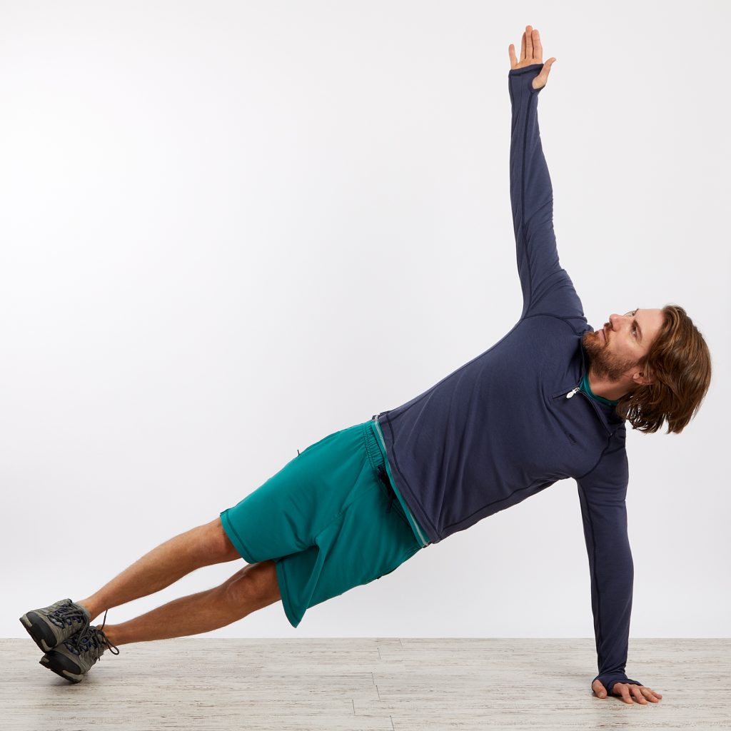 Man doing yoga wearing bamboo clothing