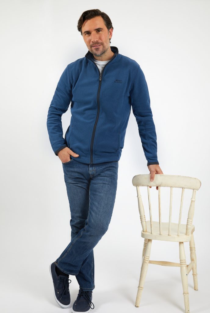Man in fleece hoodie and jeans